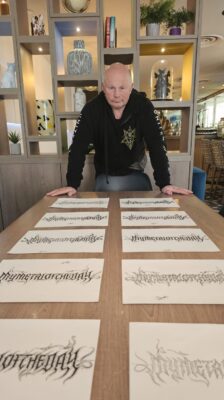 Christophe Szpajdel, aka "The Lord of the Logos," with mymetaloftheday logos